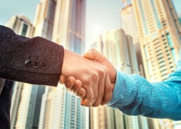 Networking Events Corde Concepts Handshake Handschlag vor Hochhaus Business