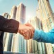 Networking Events Corde Concepts Handshake Handschlag vor Hochhaus Business